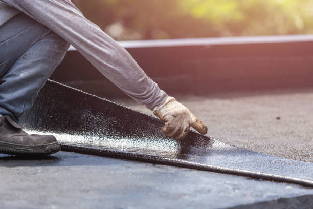 Professional Basement Waterproofing technician working in Miller Place, NY